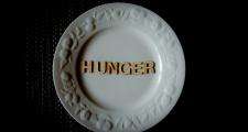 Plate with hunger written on it