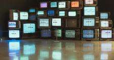 A wall of tv screens