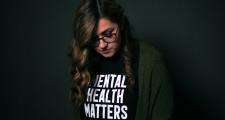 Girl wearing mental health matters t shirt