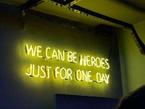 Image by Gabriel Bassino quoting 'We can be heroes just for one day' lyric