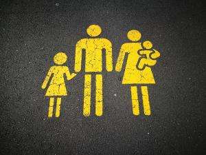 Sandy Millar image of road sign featuring family